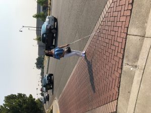 blind with a cane crossing the street during mobility training